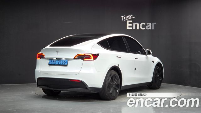 Tesla Model Y RWD — пробег 23 587 км — фото 2 из 5